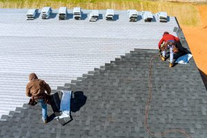 Workers doing a roof replacement